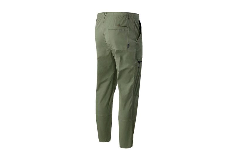 new balance all terrain woven pant gruen mp13507nse 01