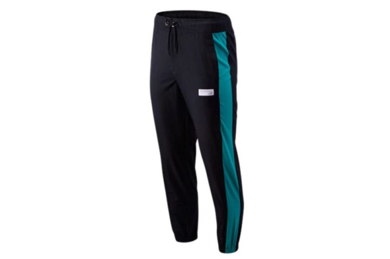 new balance athletics windbreaker pants schwarz turkis mp91507vde